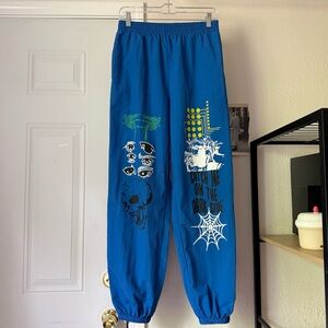 VITRIOL cobalt royal nylon elastic pull on graphic anime‎ cropped jogger pants